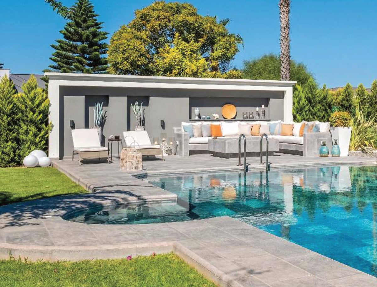 Pool Garden Grey porcelain pool deck tile around a residential pool, project example