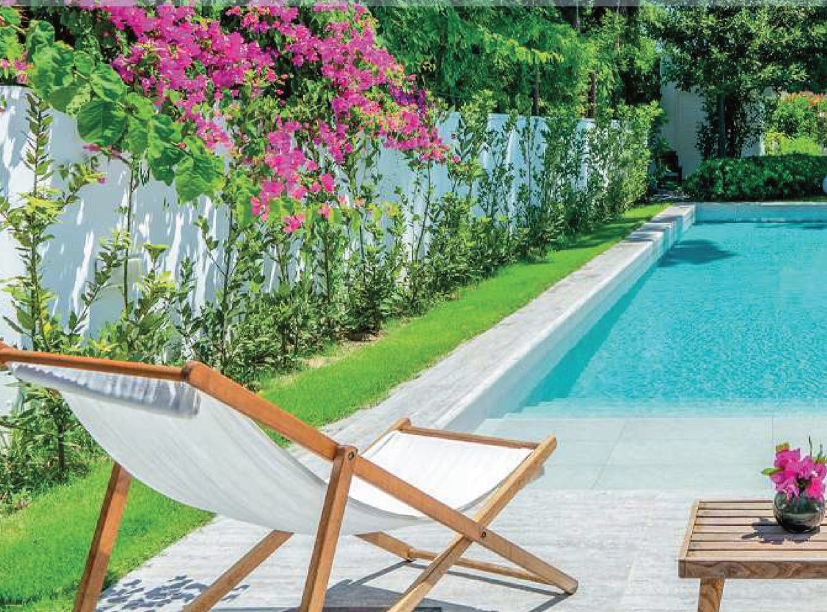 SeraPool Natural Snow White porcelain pool tile installed in a finished pool project