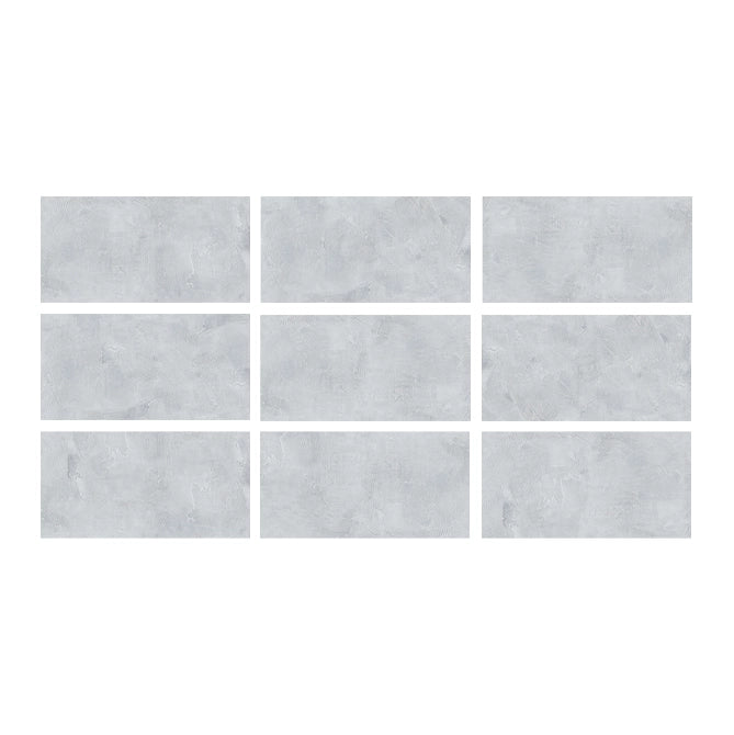 SeraPool Relax Cemento Grey porcelain pool tile showing nine face variations in a soft grey concrete-look finish.