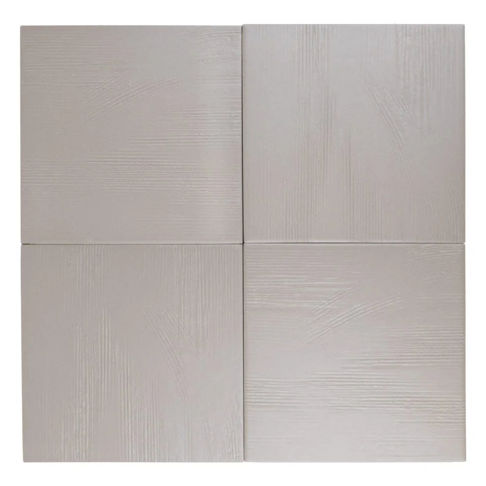 Four-tile layout of Taupe Ember 7×7 porcelain tiles showcasing organic texture variation.