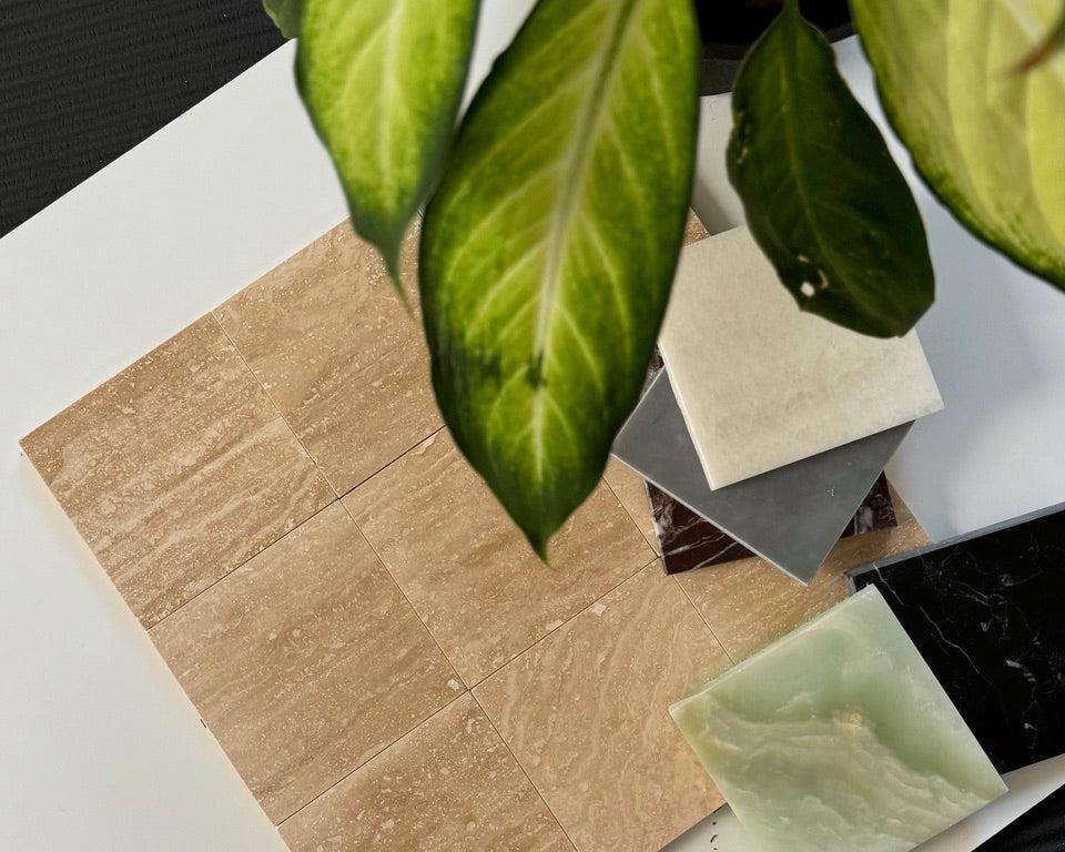 A checkerboard tile arrangement featuring classic vein-cut Roman Travertine tiles alongside the rich red tones of Rojo Alicante marble. The mix of beige travertine and red marble creates a timeless design for upscale flooring or wall applications.