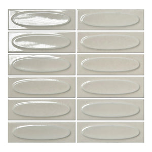Vellora Linen Mist 2×6 oval porcelain mosaic sheet with a glossy warm-neutral dimensional finish
