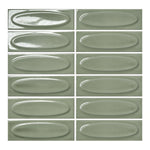 Vellora Sage Laurel 2×6 oval porcelain mosaic sheet with a glossy dimensional green finish
