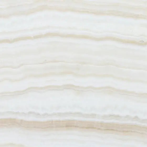 Vanilla Onyx Vein- Cut Stone Tile in polished finish with creamy white tones and subtle veining.